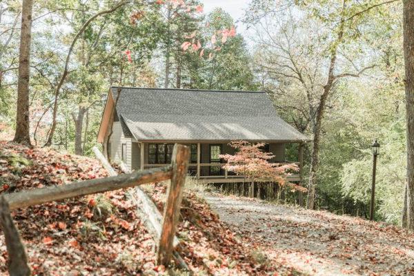 a cabin in the woods in fall