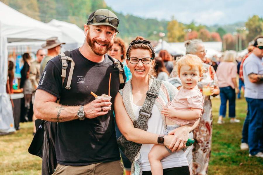 family of 3 enjoying georgia apple festival